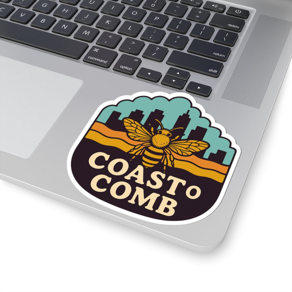 Sticker with 'Coasto Comb' design on a laptop