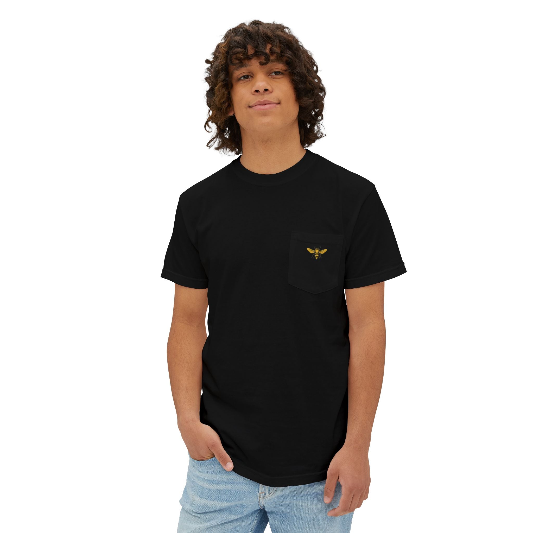 Person wearing a black t-shirt with a yellow logo on a white background