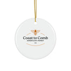 Round white ceramic ornament with 'Coast to Comb American Honey' logo on a white background