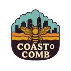 Logo of Coast o Comb with a bee and cityscape design on a white background