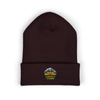 Brown beanie with 'Coastal Comb' logo on a white background