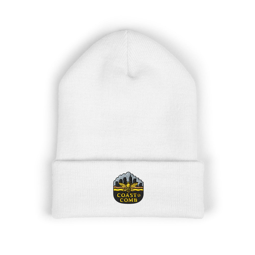 White beanie with a logo on the left side against a white background